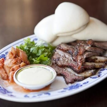As perfectly smoked as anything in the South. Try juicy brisket ($23) with steamed Chinese buns, or oddball items like lamb ribs with tofu yogurt ($14). + backyard pig roasts Sundays in the summer.