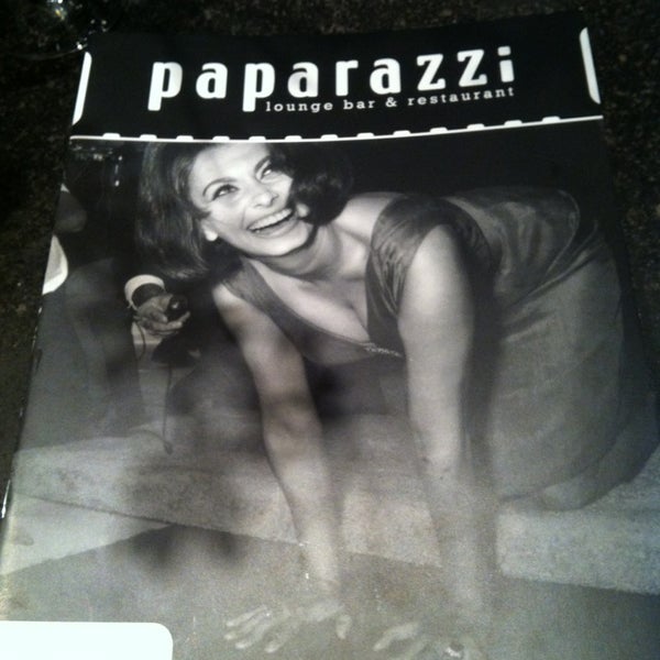 Photo taken at Paparazzi Lounge Bar &amp; Restaurant by Peter B. on 3/20/2013
