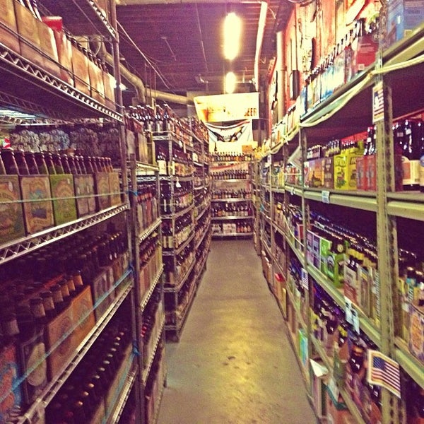 Photo taken at New Beer Distributors by Joao Filho on 7/4/2013