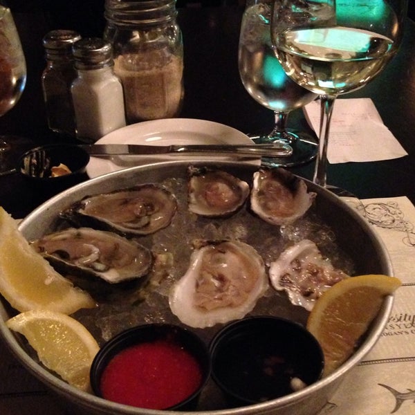 Photo taken at Doc Magrogan&#39;s Oyster House by Shannon M. on 4/11/2014