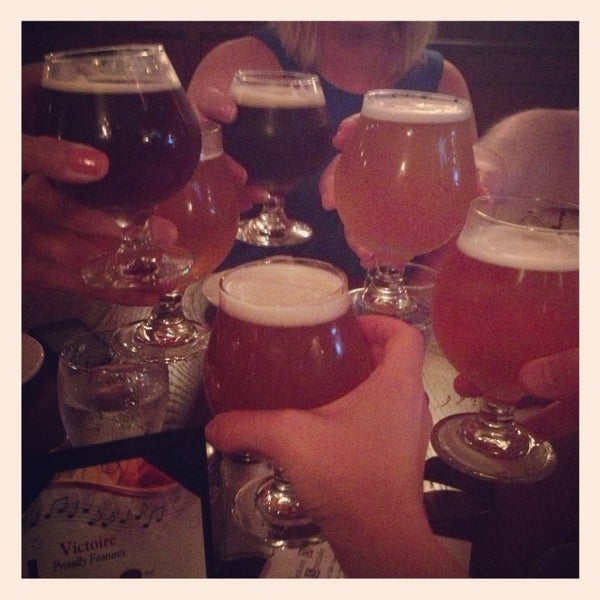 Photo taken at Victoire: A Belgian Beer Bar &amp; Bistro by Bethany L. on 7/5/2013