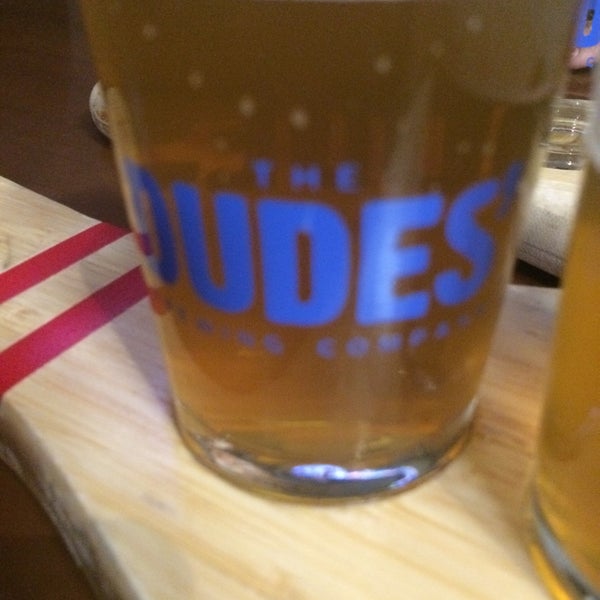 Photo taken at The Dudes&#39; Brewing Company by Carlos S. on 3/25/2018