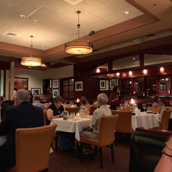 Photo taken at Sullivan&#39;s Steak House by Courtney L. on 7/13/2019