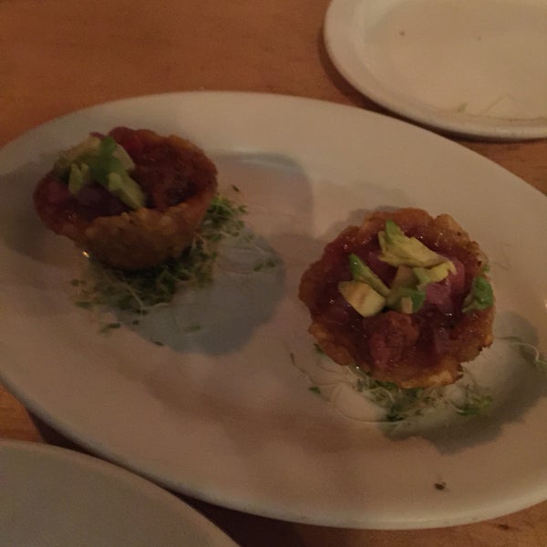 The tostones rellenos is a delicious appetizer (fried green plantains scooped with barbecued pulled beef).