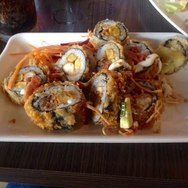 Photo taken at Sushi &amp; Cebiches by Angie P. on 1/24/2015