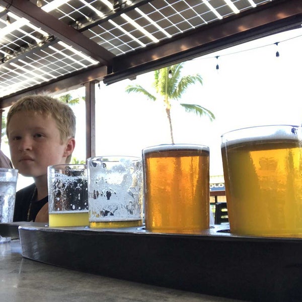Photo taken at Kauai Island Brewery &amp; Grill by Tim D. on 1/5/2022