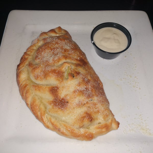 My wife and I both had the make your own calzone. It was very delicious. Prices are a little high and the atmosphere is rather noisy but the staff is extremely friendly.