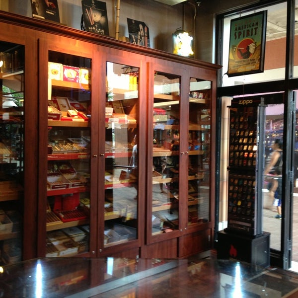 Photo taken at Bayside Cigars by Cengiz D. on 5/23/2013