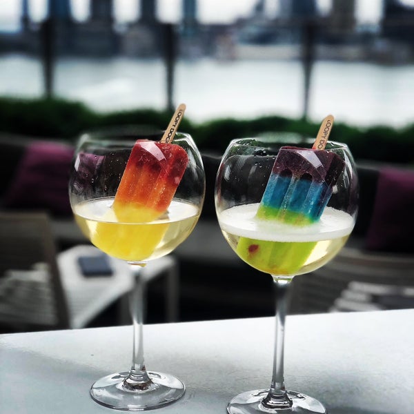 Try the original Prosecco and Ice Pops - this is the first bar to offer them in NYC and still a classic with incredible views of the Hudson.  Arrive early for a good seat.