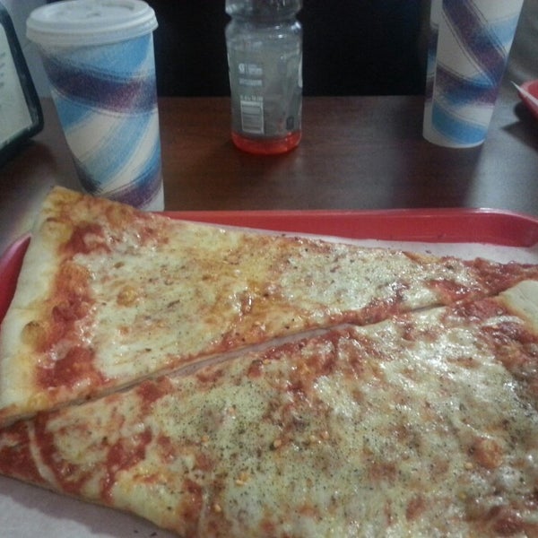 Photo taken at Gina&#39;s Pizzeria and Restaurant by Jesus H. on 7/21/2014