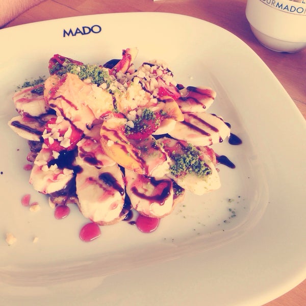 Photo taken at Mado Cafe by Şeyma Y. on 6/14/2015