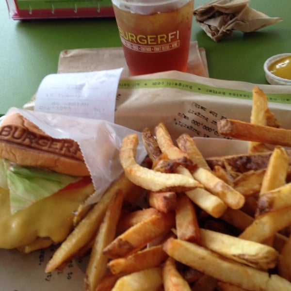 Photo taken at BurgerFi by Brian H. on 4/17/2014