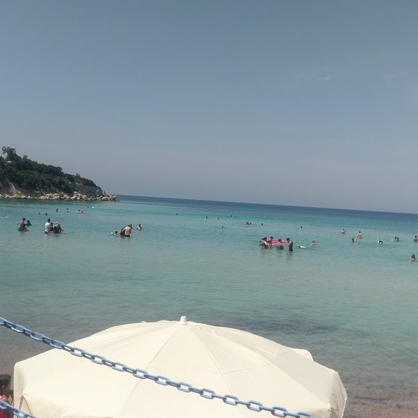 Photo taken at İkizler Beach by Emre A. on 7/23/2018