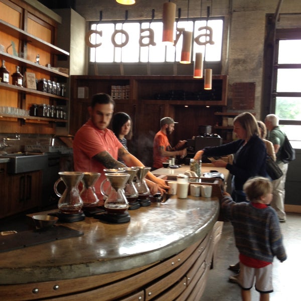 Photo taken at Coava Coffee Roasters Cafe by Chau V. on 5/8/2013