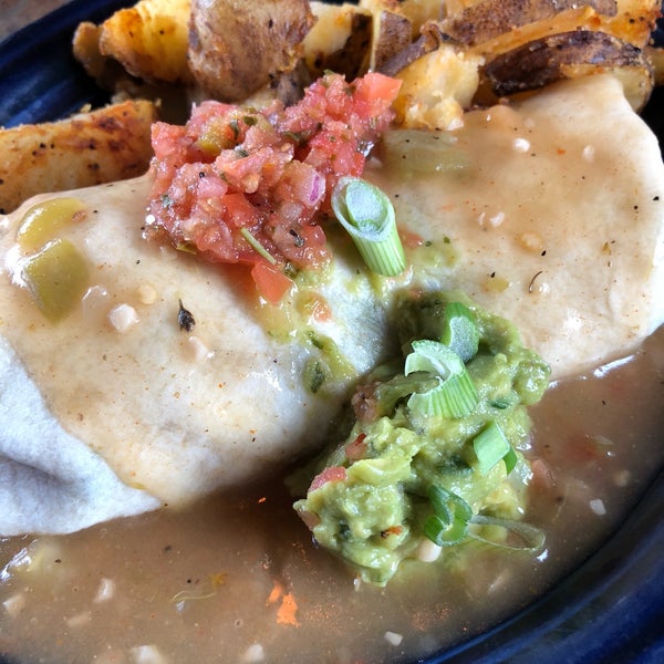 Smothered breakfast burrito with tofu, veggie green Chile, and no cheese or sour cream was delish!