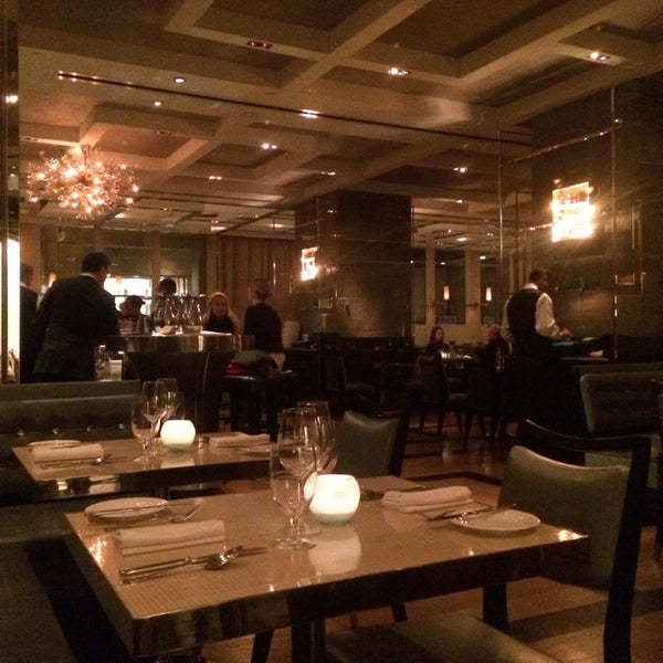Photo taken at Gordon Ramsay at The London by M on 1/2/2014