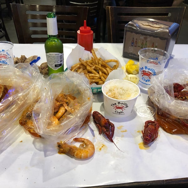 Photo taken at The Boiling Crab by Adam B. on 5/4/2019