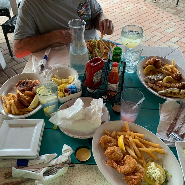 Photo taken at Seabreeze Island Grill by Emily D. on 8/11/2019
