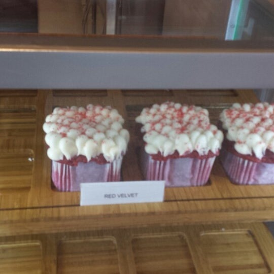 Photo taken at Cupcakes Cubed by Aesha I. on 3/20/2014