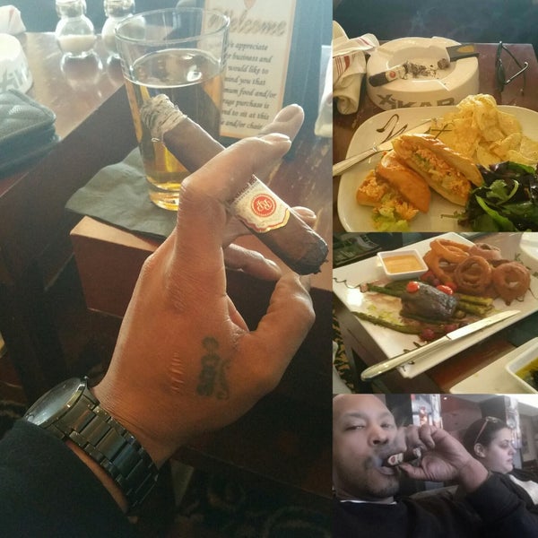 This place is great. Good food, drinks, tvs, and a great selection of cigars!!!
