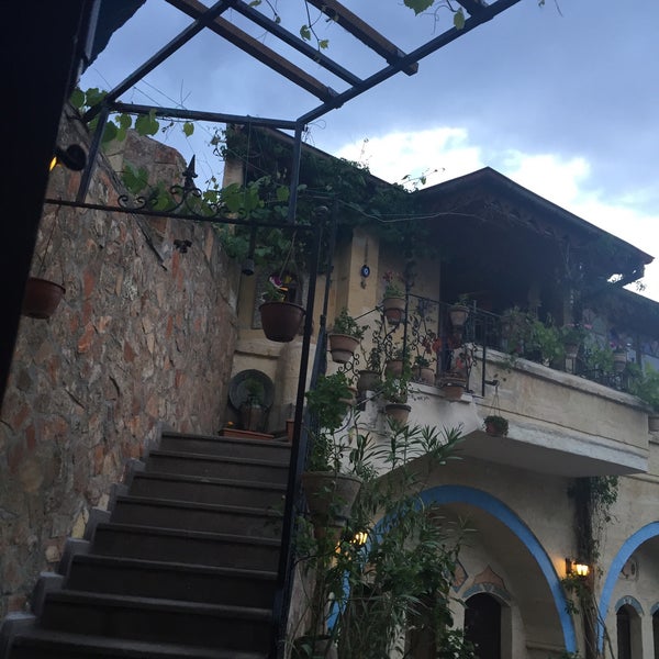 Photo taken at Pacha Hotel &amp; Restaurant by Pınar B. on 5/24/2015
