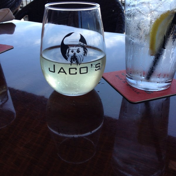 Photo taken at Jaco&#39;s Bayfront Bar &amp; Grille by Virginia M. on 4/6/2013