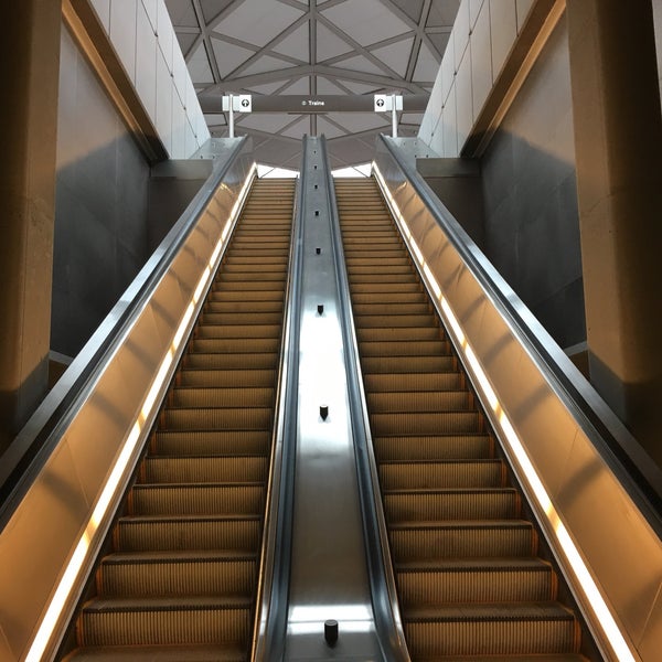 Photo taken at Tysons Metro Station by Samir L. on 4/9/2018
