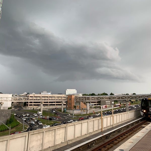 Photo taken at Tysons Metro Station by Samir L. on 6/18/2019