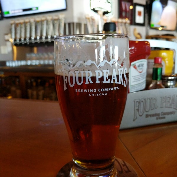 Photo taken at Four Peaks Grill &amp; Tap by Mike P. on 3/23/2018