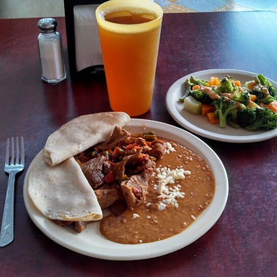 Photo taken at Ricos Tamales by Salvador F. on 2/26/2014