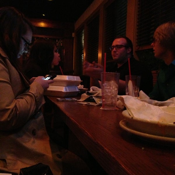 Photo taken at Snuffers by Caitlin S. on 3/6/2013