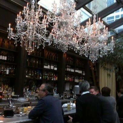 Photo taken at Isola Trattoria &amp; Crudo Bar by Paul A. on 12/19/2012