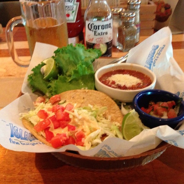 Try their grilled fish tacos with a corona with salt & lime!