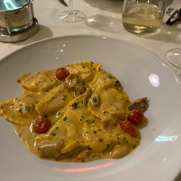 The ravioli was delicious and the house white wine was smooth and delicate.