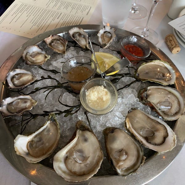 Photo taken at Henlopen City Oyster House by Chris M. on 5/14/2019