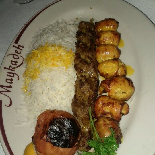 Photo taken at Maykadeh Persian Cuisine by Christine L. on 1/18/2012