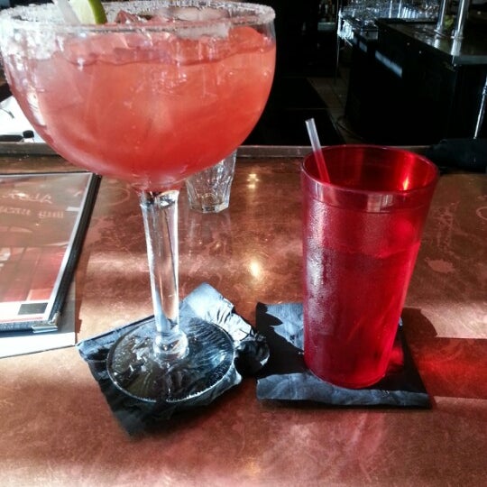 Photo taken at Roja Mexican Grill + Margarita Bar by Lisa P. on 8/5/2012