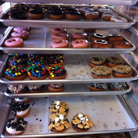 Photo taken at Peace Love &amp; Little Donuts by Dennis Z. on 3/13/2012