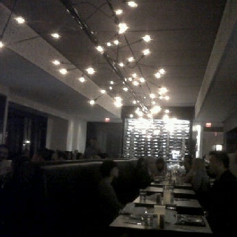 Photo taken at Oliver &amp; Bonacini Café Grill, Yonge and Front by Dolphy l. on 9/29/2011
