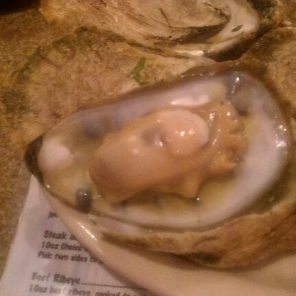 Photo taken at A.W. Shucks Raw Bar &amp; Grill by labellainghent on 11/27/2011