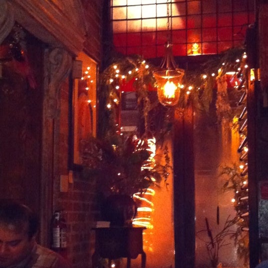 Photo taken at Kalendar Restaurant &amp; Bistro by Tara G. on 1/1/2011
