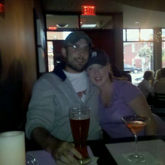 Photo taken at Downtown Main Martini Bar &amp; Grille by Jonathan C. on 9/9/2011