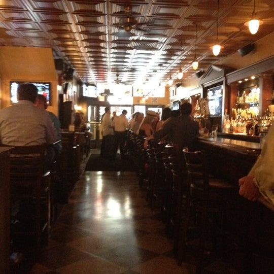 Photo taken at Mulligan&#39;s Pub by Anthony J. on 8/23/2012