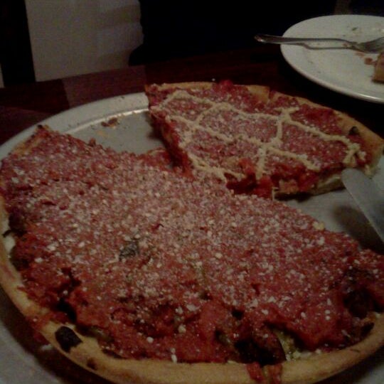 Photo taken at Kylie&#39;s Chicago Pizza by Ad r. on 10/13/2011