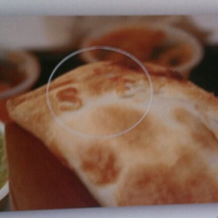 All the empanadas look the same. Look for the 2 letter code imprinted on the crust to identify what they are.