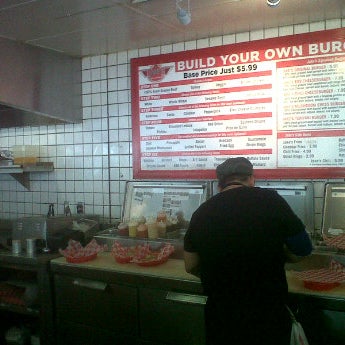 Photo taken at Jake&#39;s Burgers &amp; Billiards by Julie D. on 3/18/2012
