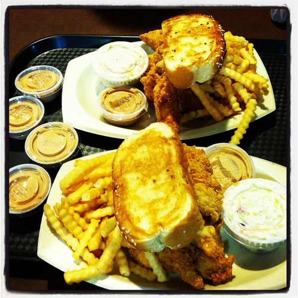 Photo taken at Raising Cane&#39;s Chicken Fingers by Stephanie E. on 6/26/2012