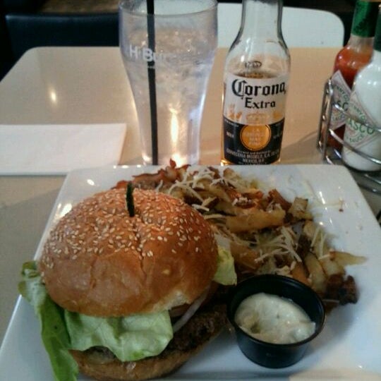 Photo taken at H Burger by Bobby P. on 5/2/2012