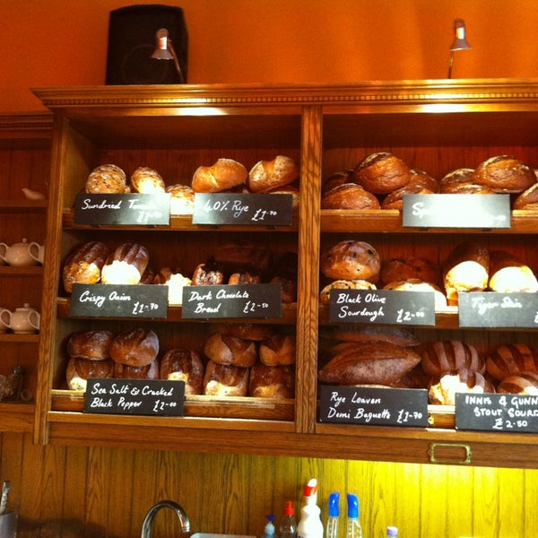 Photo taken at The Manna House Bakery &amp; Patisserie by Ollie C. on 7/6/2013