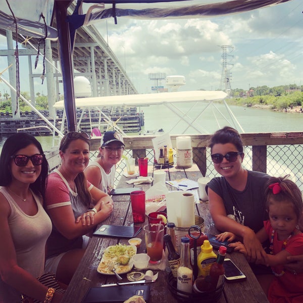 Photo taken at Outriggers Seafood Bar &amp; Grill by Laci on 8/20/2018